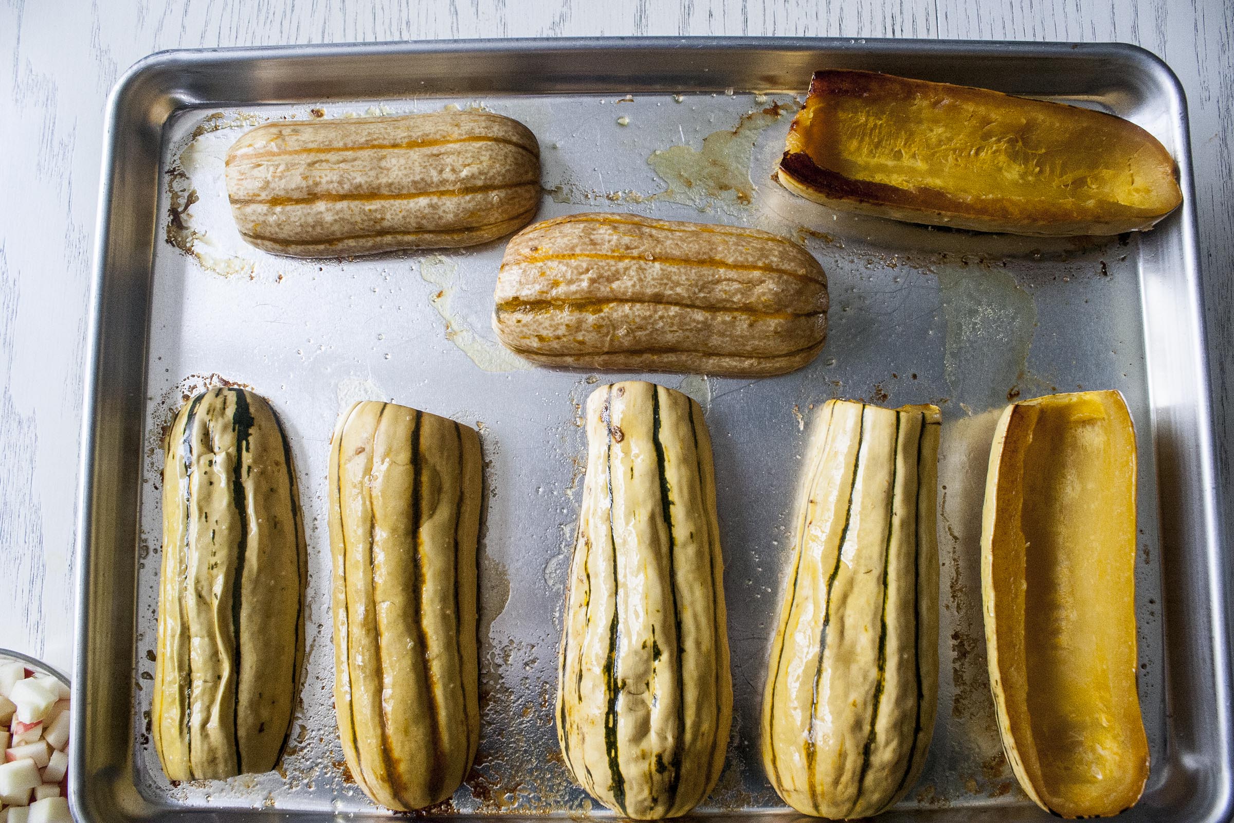 These delicata squash have been halved and roasted.