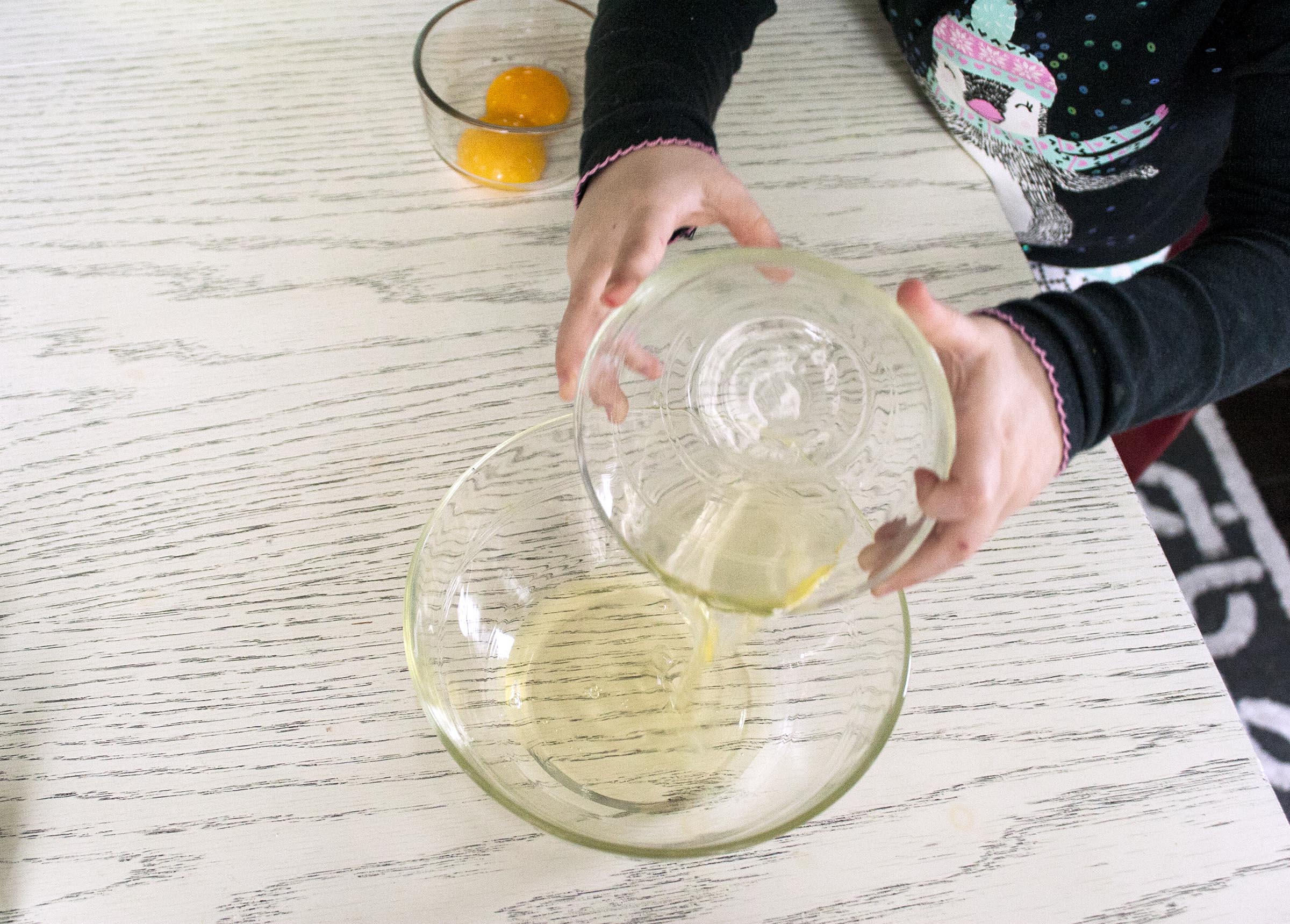 Cooking with kids. Adding separated egg white to bowl for Triple Coconut Cookies I lifeaswecookit.com