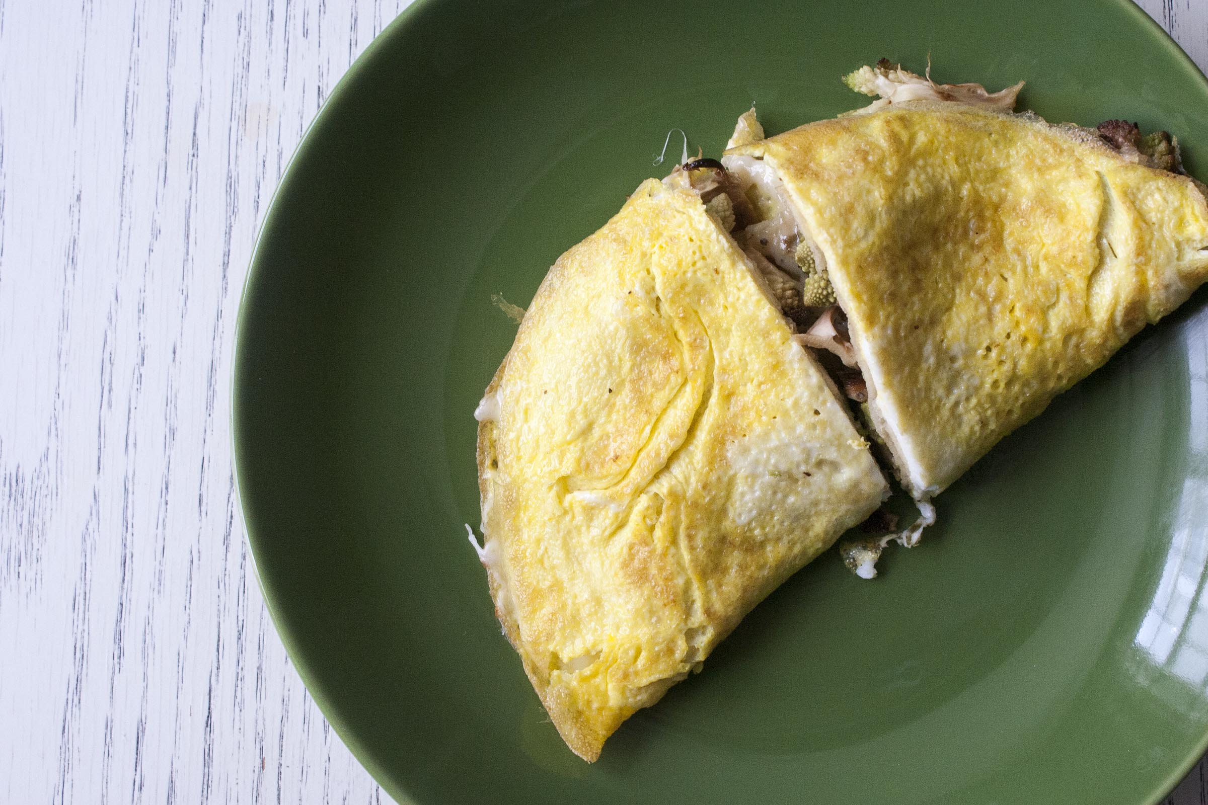 Five Minute Breakfast: Beaten Egg quickly cooked, then topped with a corn tortilla, cheese and roasted romesco. lifeaswecookit.com