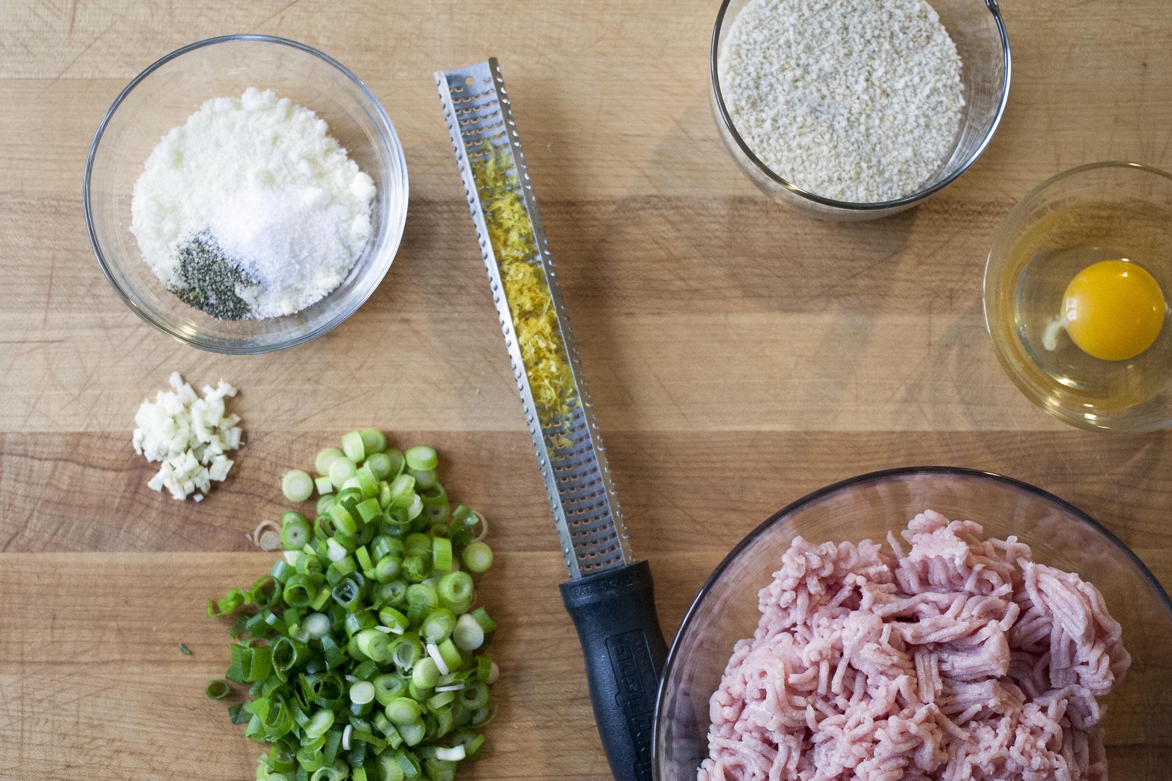 Ingredients for Lemon-Chicken Meatballs, headed into soup with peas and grated pasta. lifeaswecookit.com