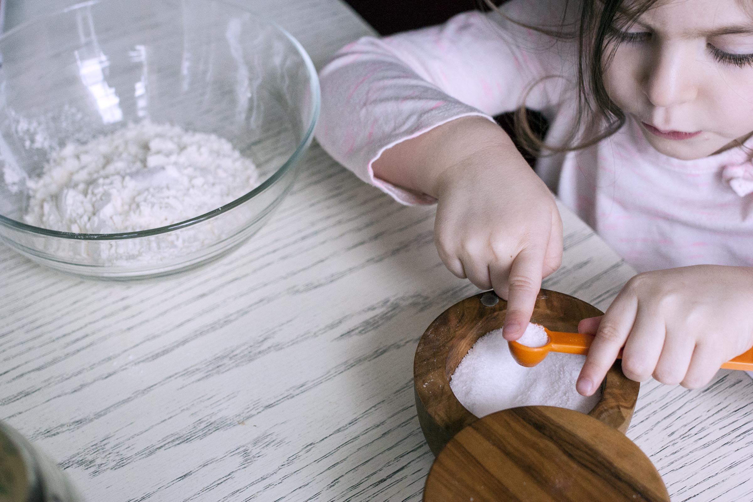 Measuring salt for grated pasta dough. lifeaswecookit.com