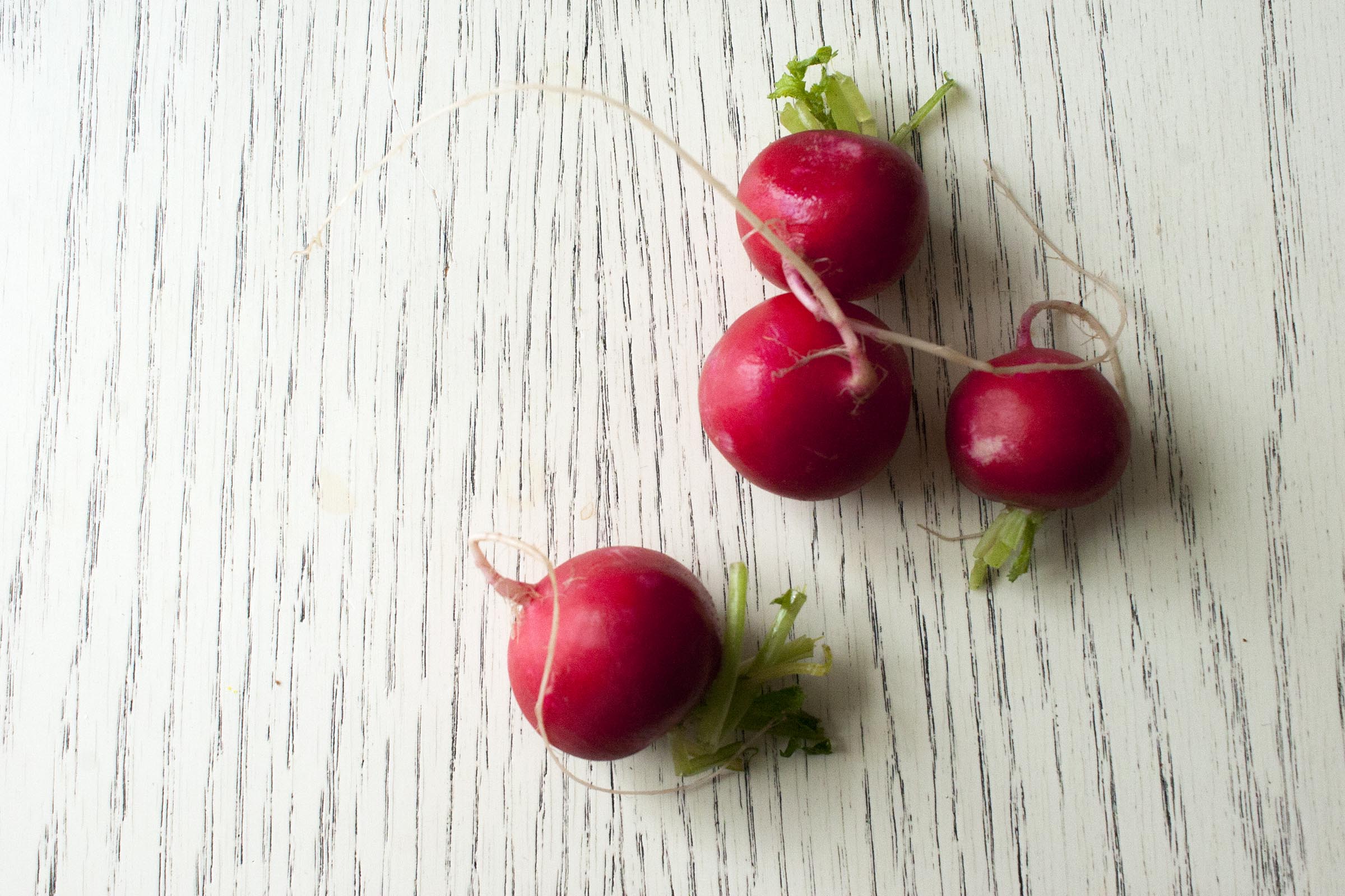 Radishes about to be sliced for Avocado and Smoked Salmon Summer Rolls. lifeaswecookit.com