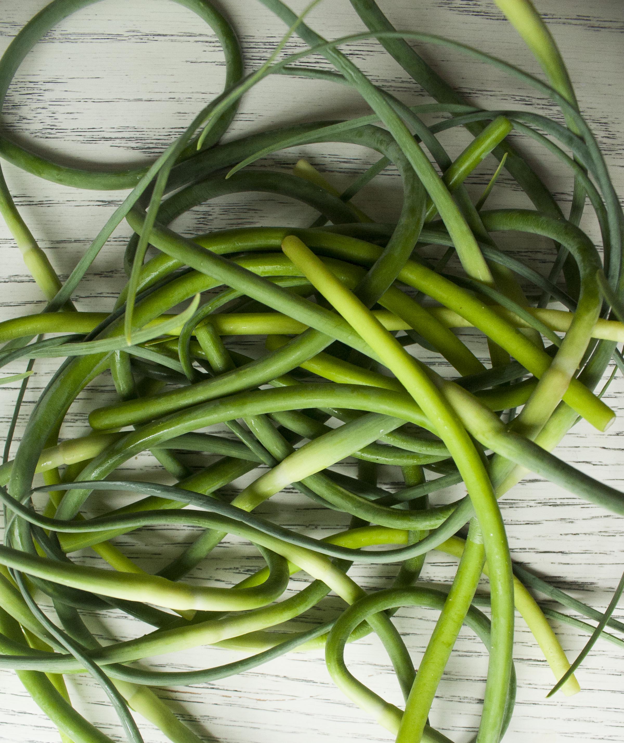 Garlic Scapes for Garlic Scape Pesto. www.lifeaswecookit.com