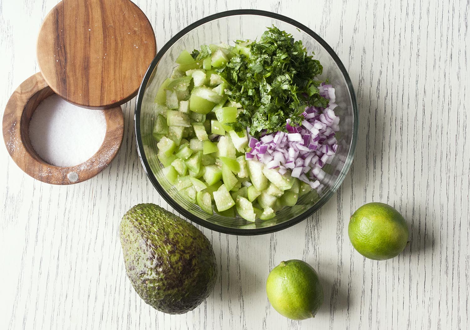 Ingredients for a fresh, chunky and bright Tomatillo & Avocado Salsa. www.lifeaswecookit.com