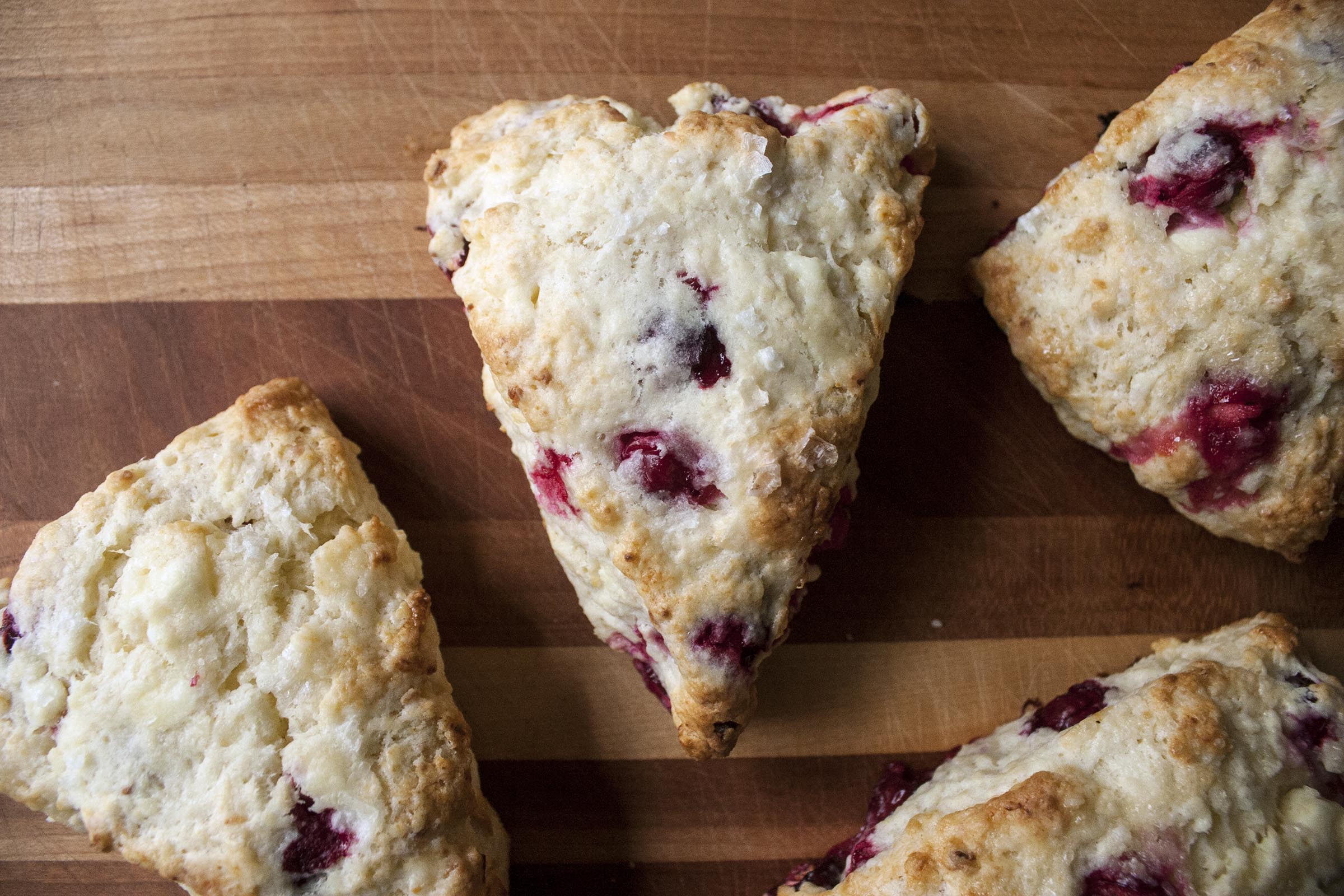 Warm, tender, tart and cheesy Cranberry Feta Scones. www.lifeaswecookit.com