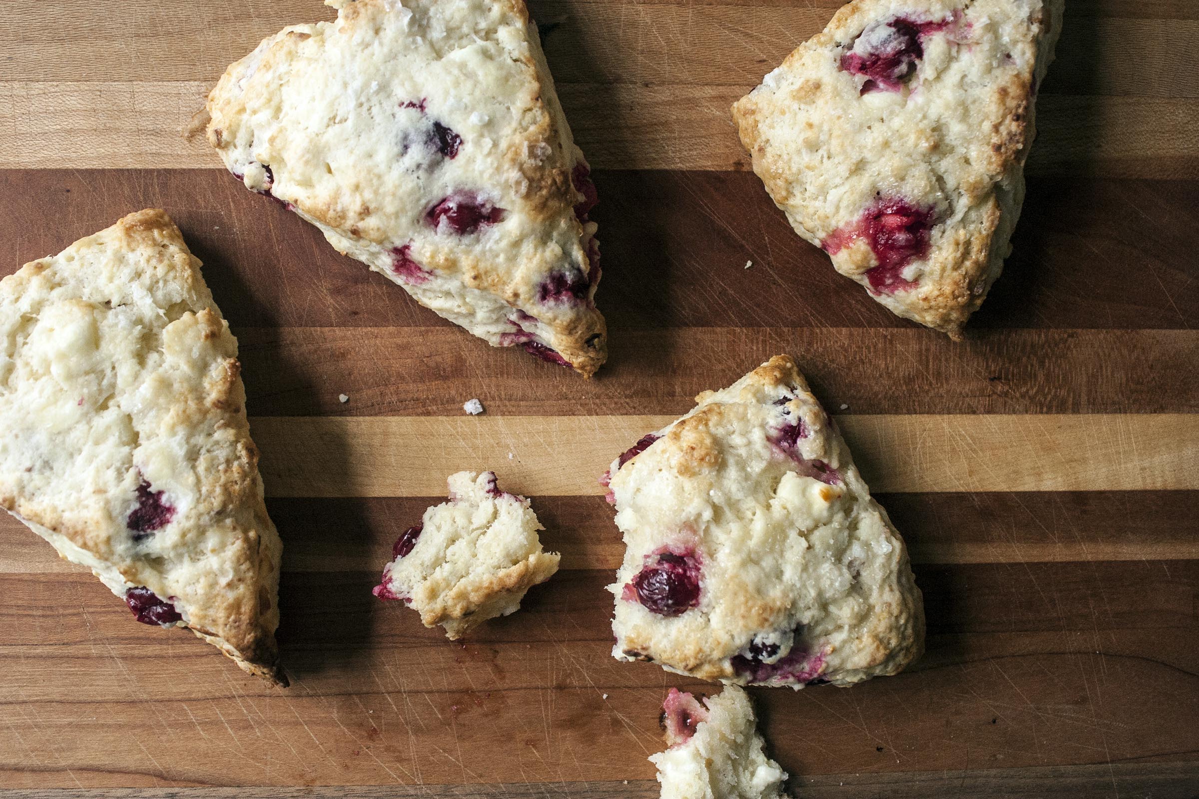 Warm, tender, tart and cheesy Cranberry Feta Scones. www.lifeaswecookit.com