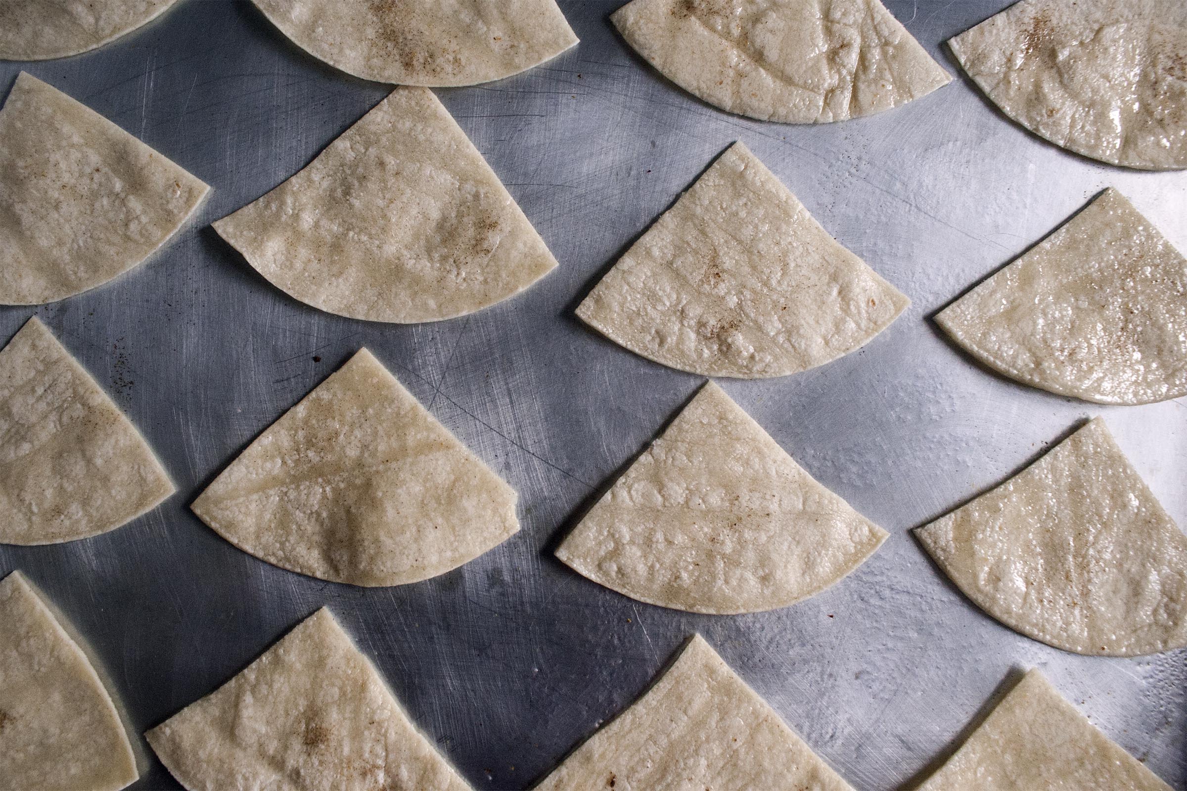 Corn tortillas, sprayed with avocado oil and sprinkled with salt and shichimi togarashi. www.lifeaswecookit.com