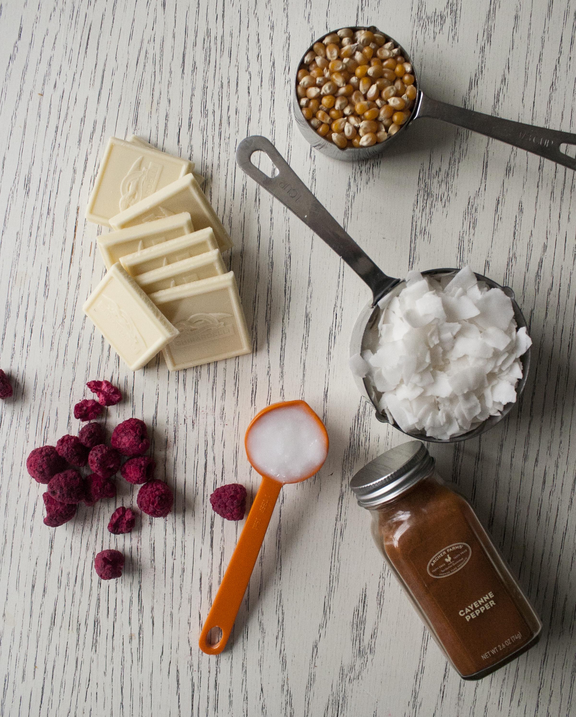 Ingredients for Coconut and Raspberry-Drizzled White Chocolate Popcorn. www.lifeaswecookit.com