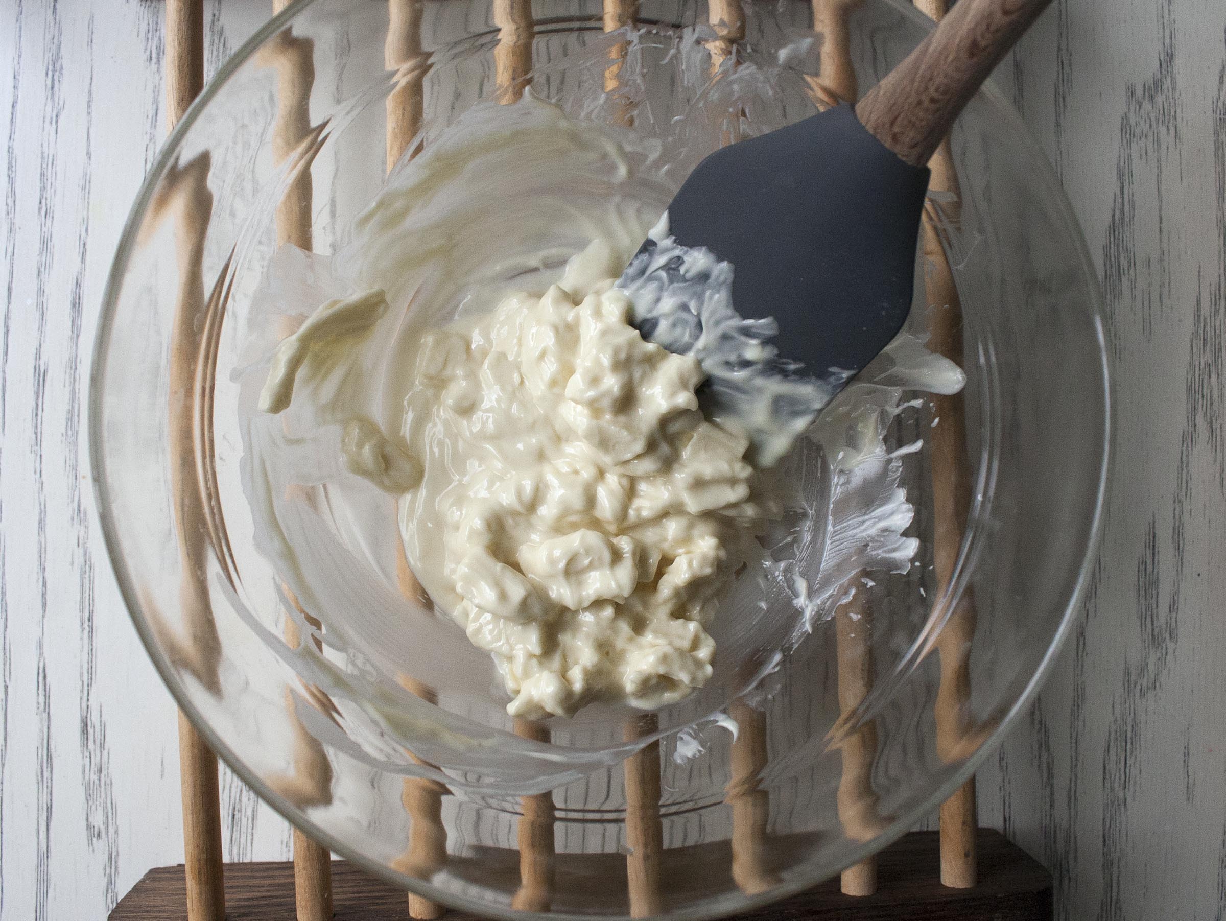 Partially Melted White Chocolate for Coconut and Raspberry-Drizzled White Chocolate Popcorn www.lifeaswecookit.com