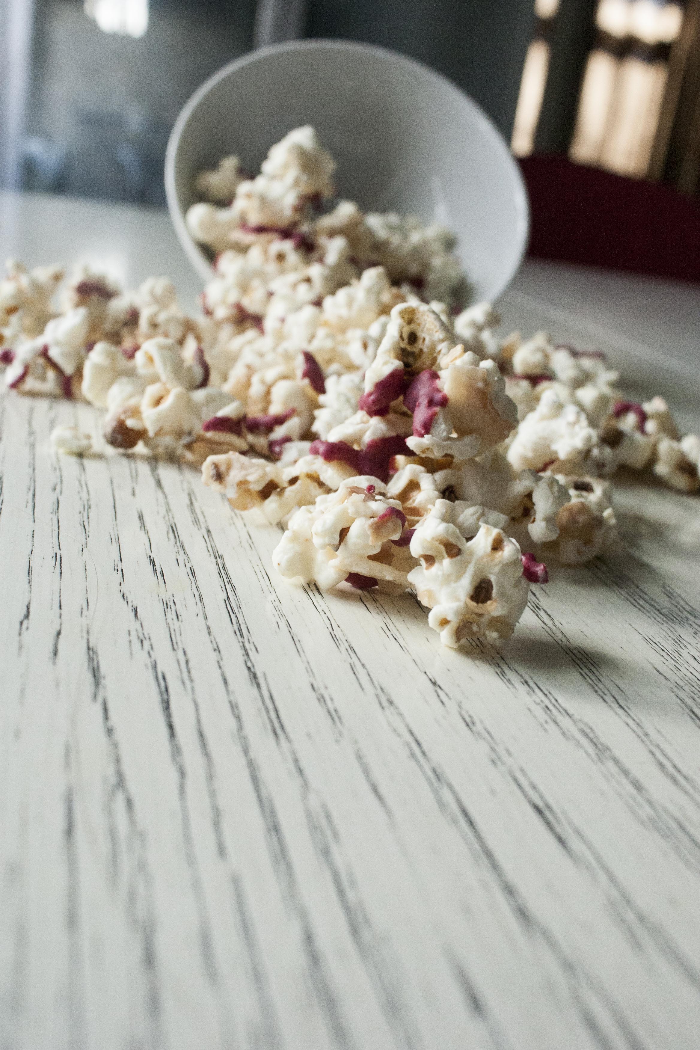 Coconut and Raspberry-Drizzled White Chocolate Popcorn www.lifeaswecookit.com