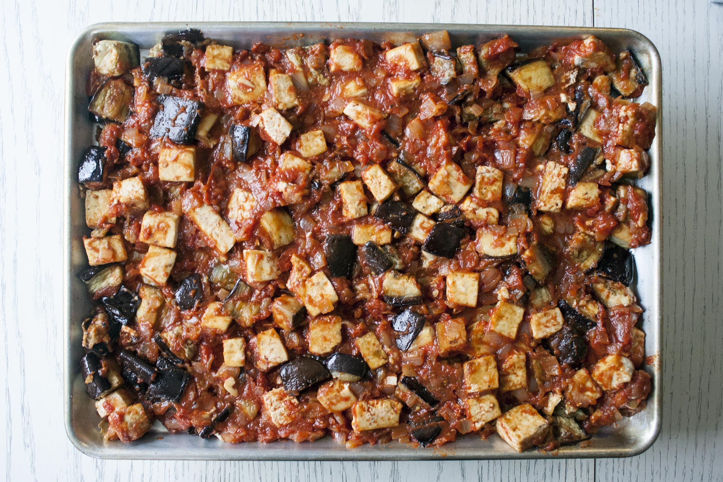 Tofu, Eggplant and Sauce for Lemony Eggplant and Tofu Sheetpan Roast. www.lifeaswecookit.com