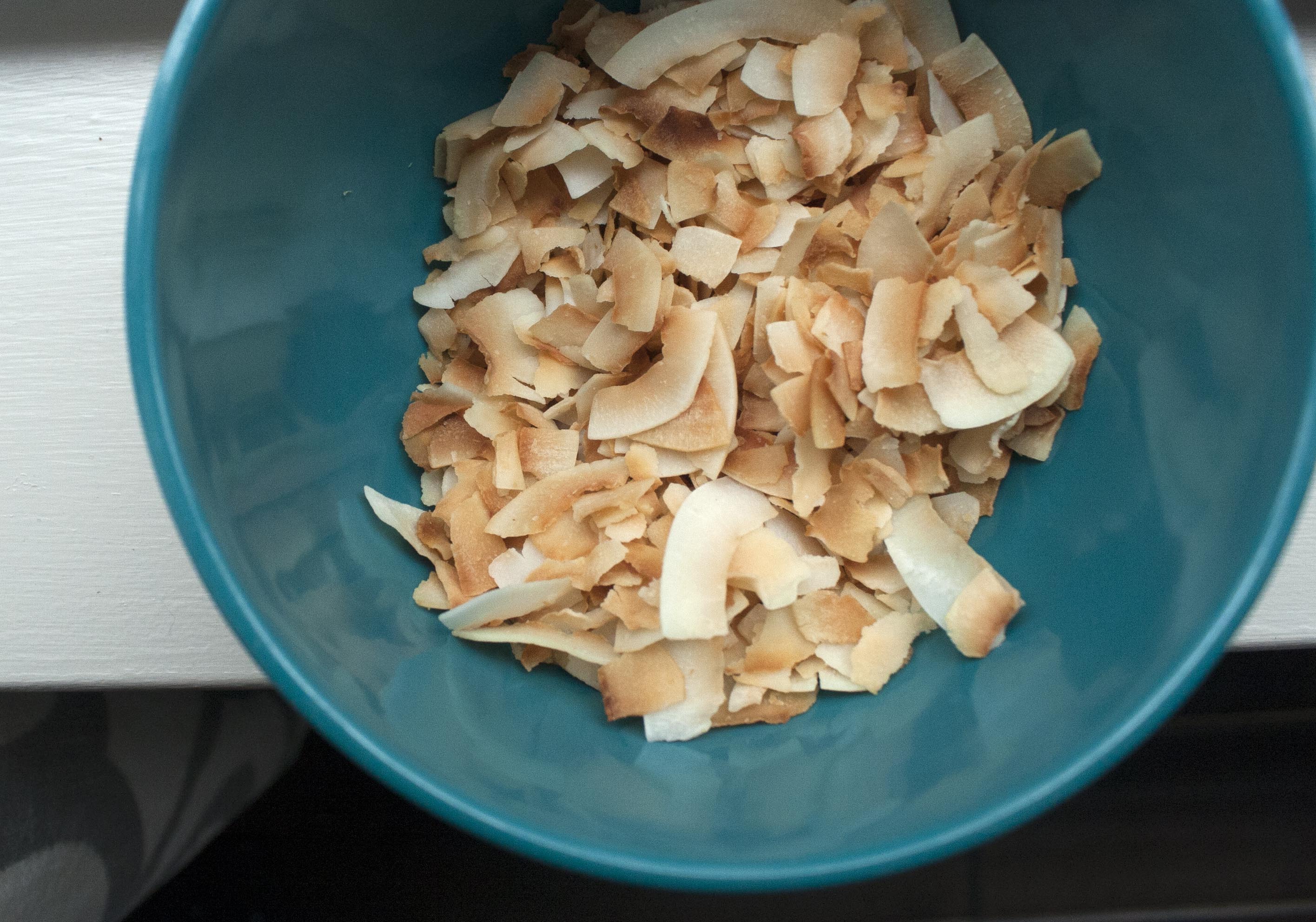 Toasted Flake Coconut for Coconut and Raspberry-Drizzled White Chocolate Popcorn. www.lifeaswecookit.com