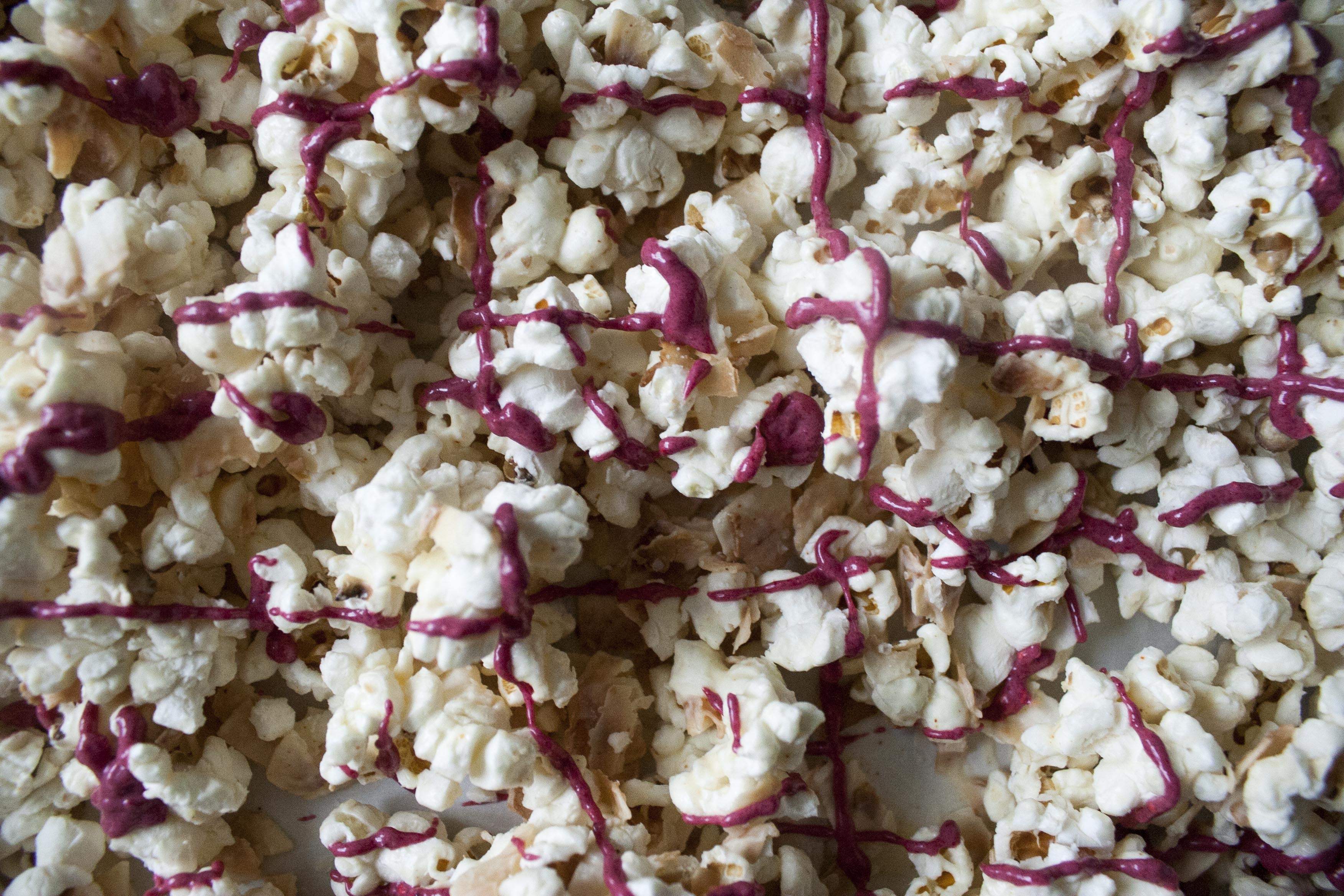 Coconut and Raspberry-Drizzled White Chocolate Popcorn www.lifeaswecookit.com